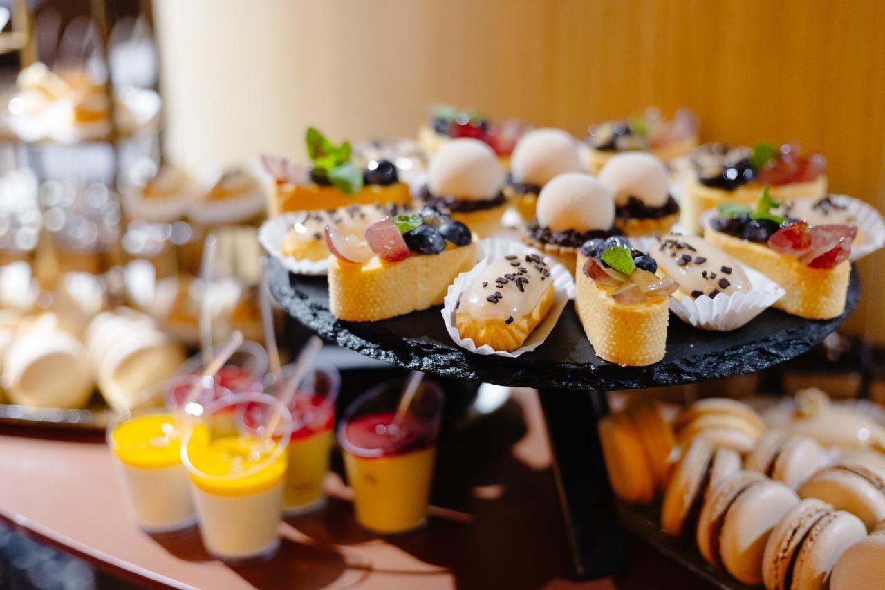 Emily Resort Lviv Exterior photo A selection of desserts