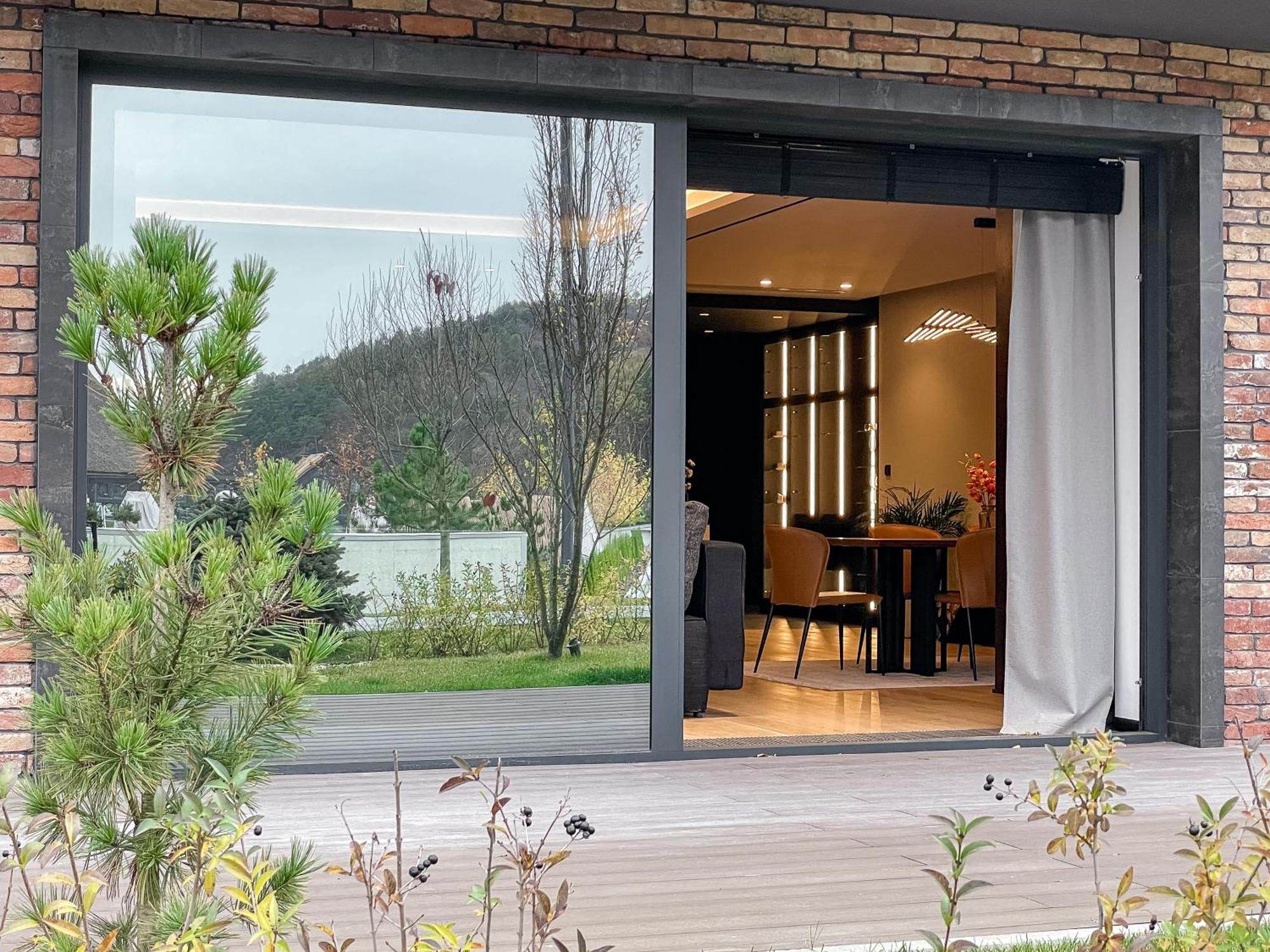 Emily Resort Lviv Exterior photo A sliding door